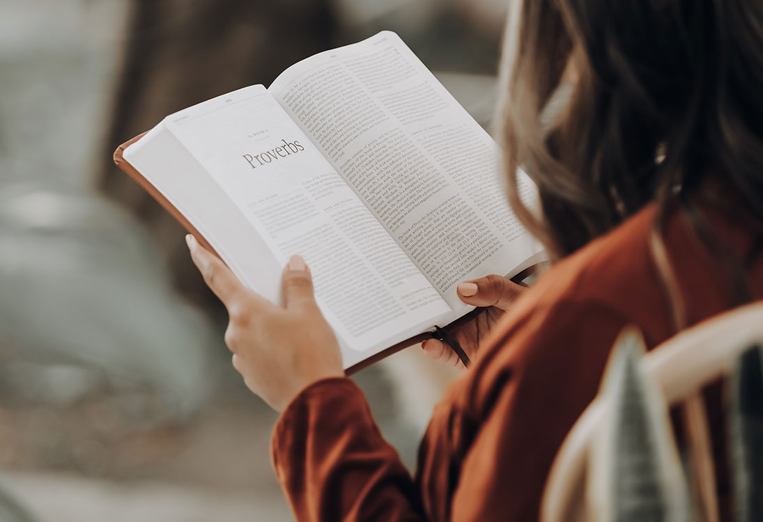 woman holding bible