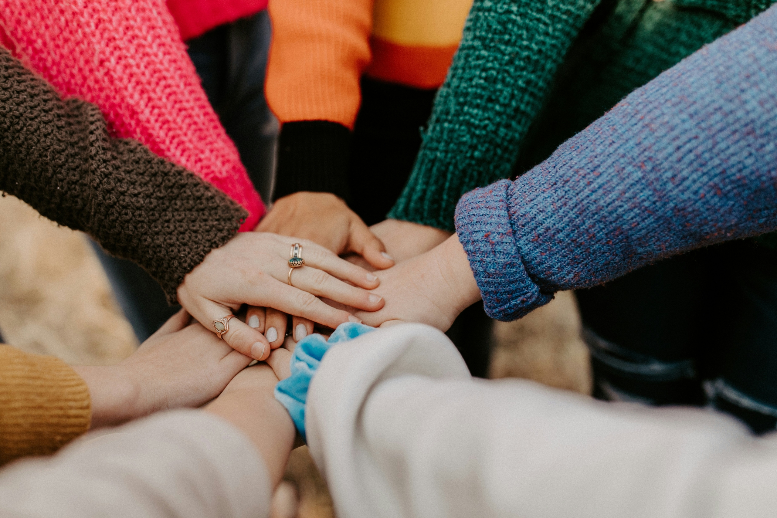 Volunteer hands together